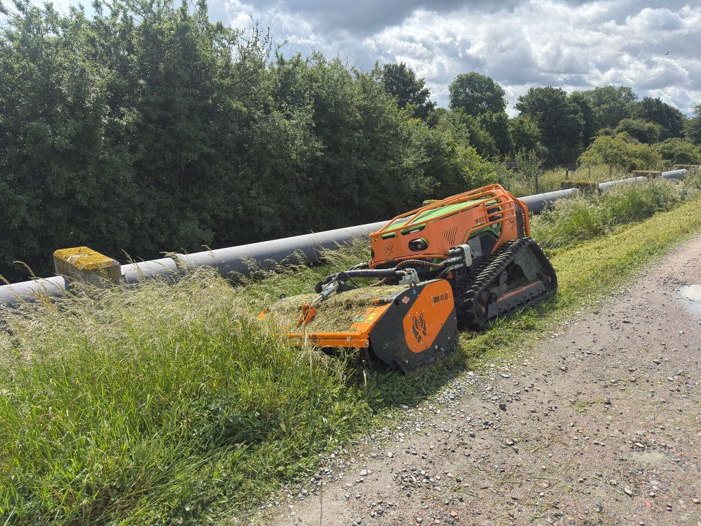 Greenclimber hire Buckinghamshire with mounted flail.